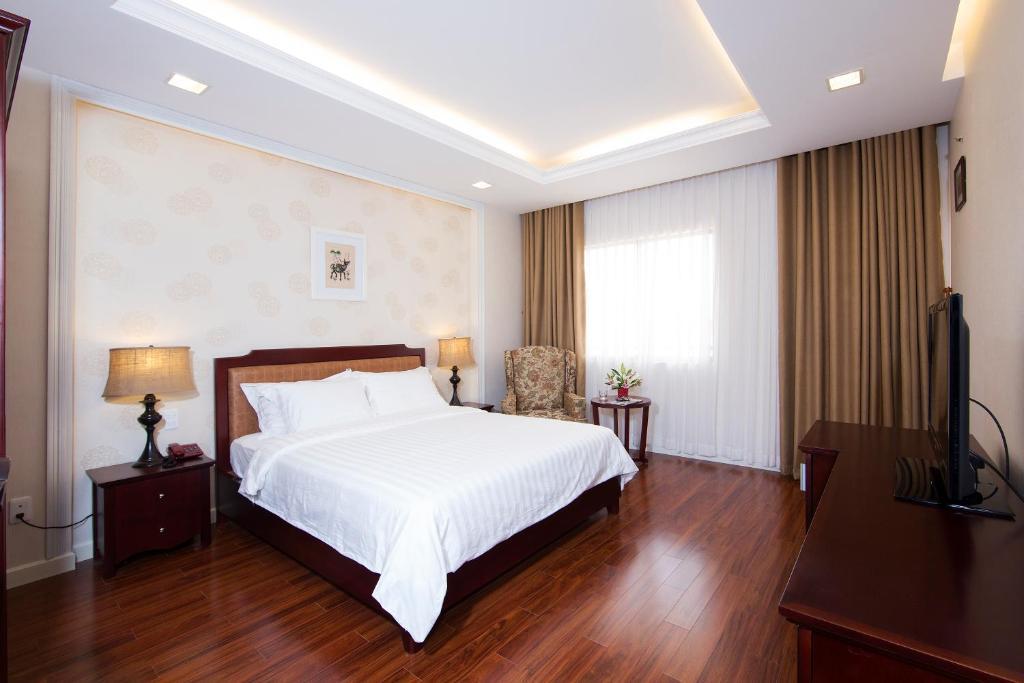 Royal Dragon Boutique Hotel Tan Binh Ho Či Minovo Město Pokoj fotografie